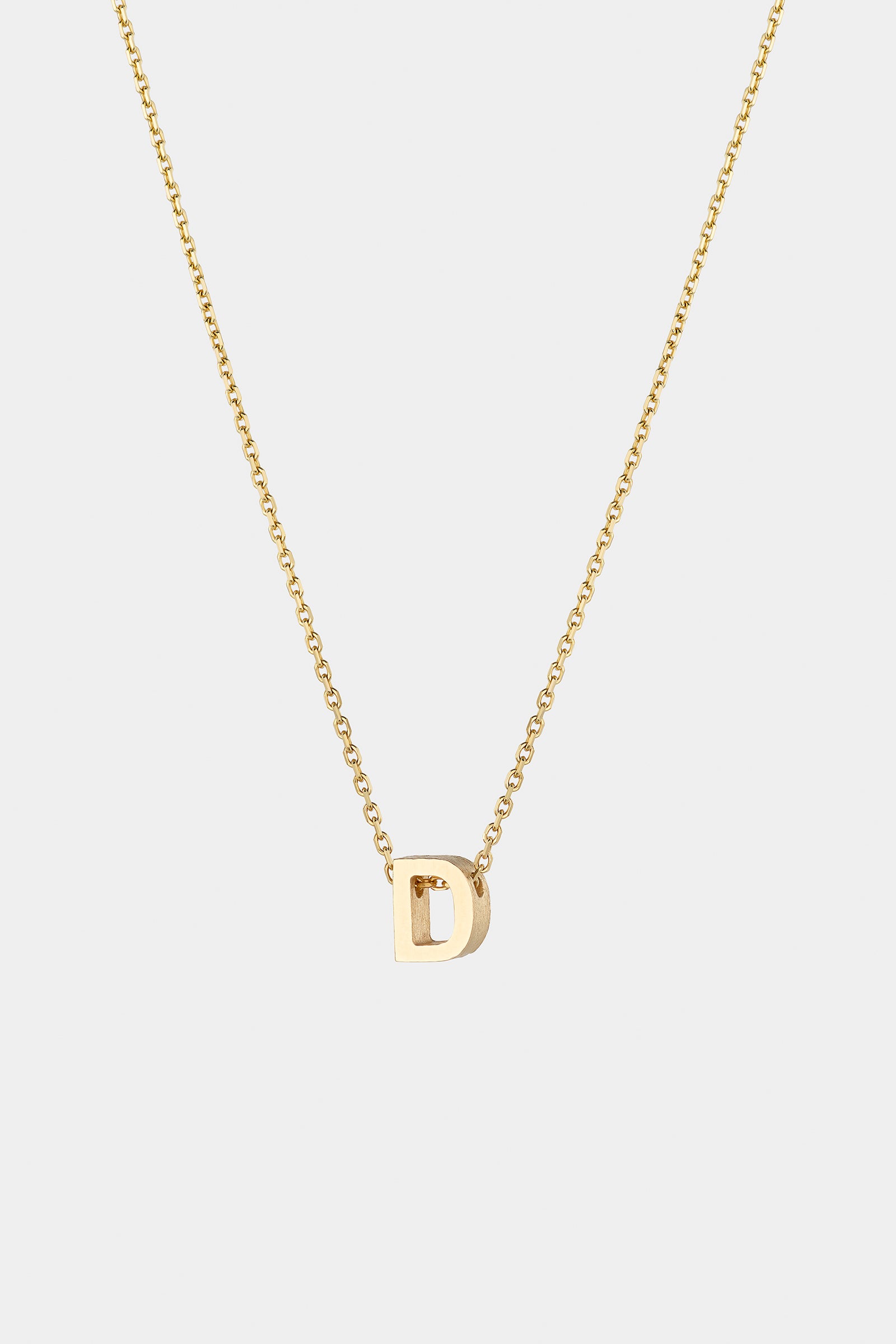 THE LETTER AUKSINĖ GRANDINĖLĖ SU DIDESNIU RAIDELĖS PAKABUKU