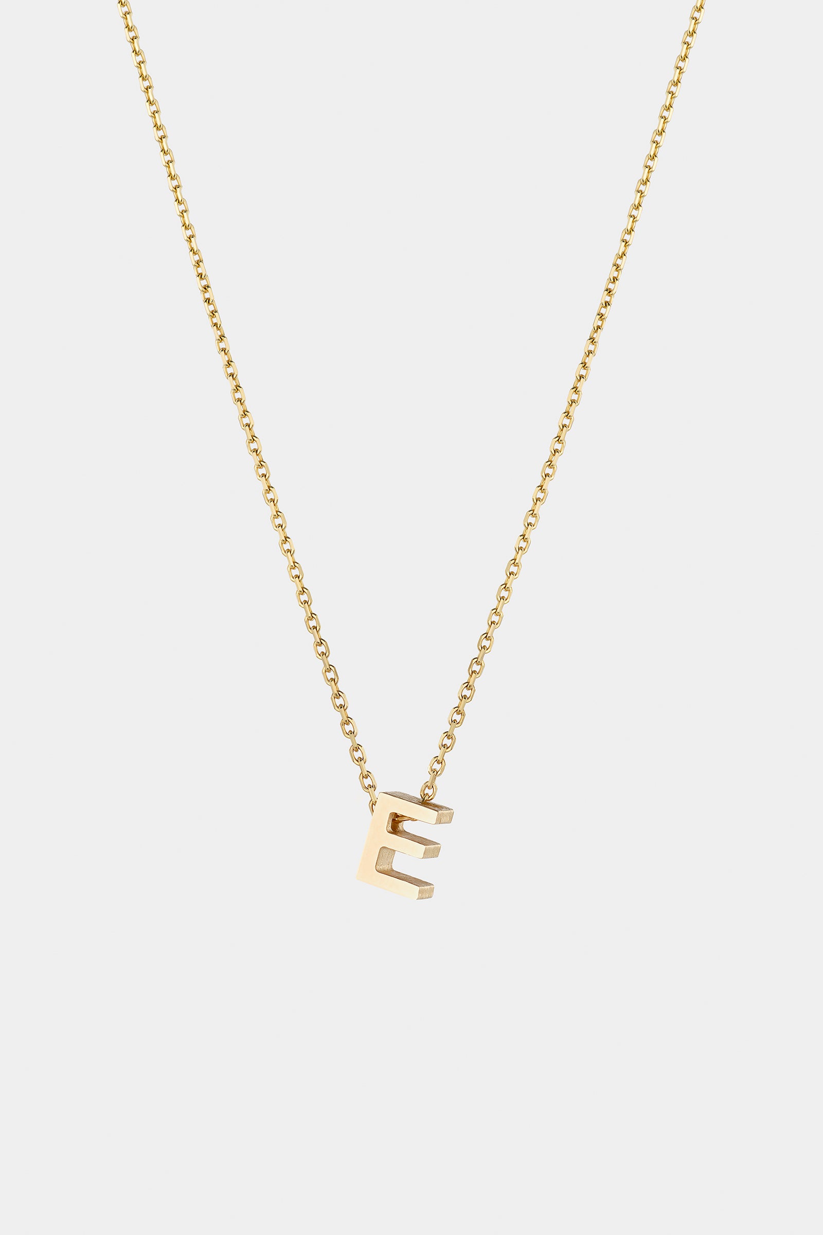 THE LETTER AUKSINĖ GRANDINĖLĖ SU DIDESNIU RAIDELĖS PAKABUKU