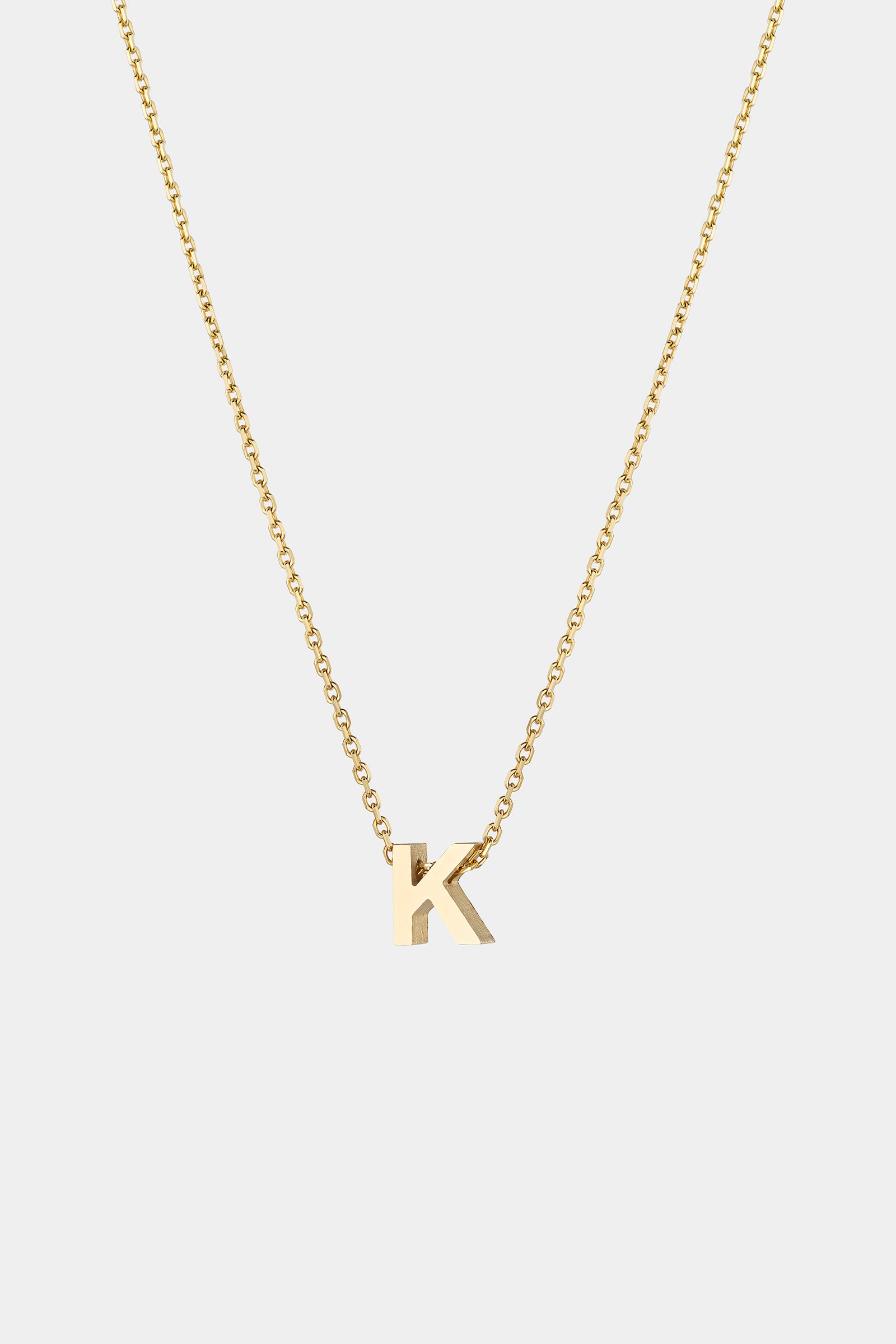 THE LETTER AUKSINĖ GRANDINĖLĖ SU DIDESNIU RAIDELĖS PAKABUKU