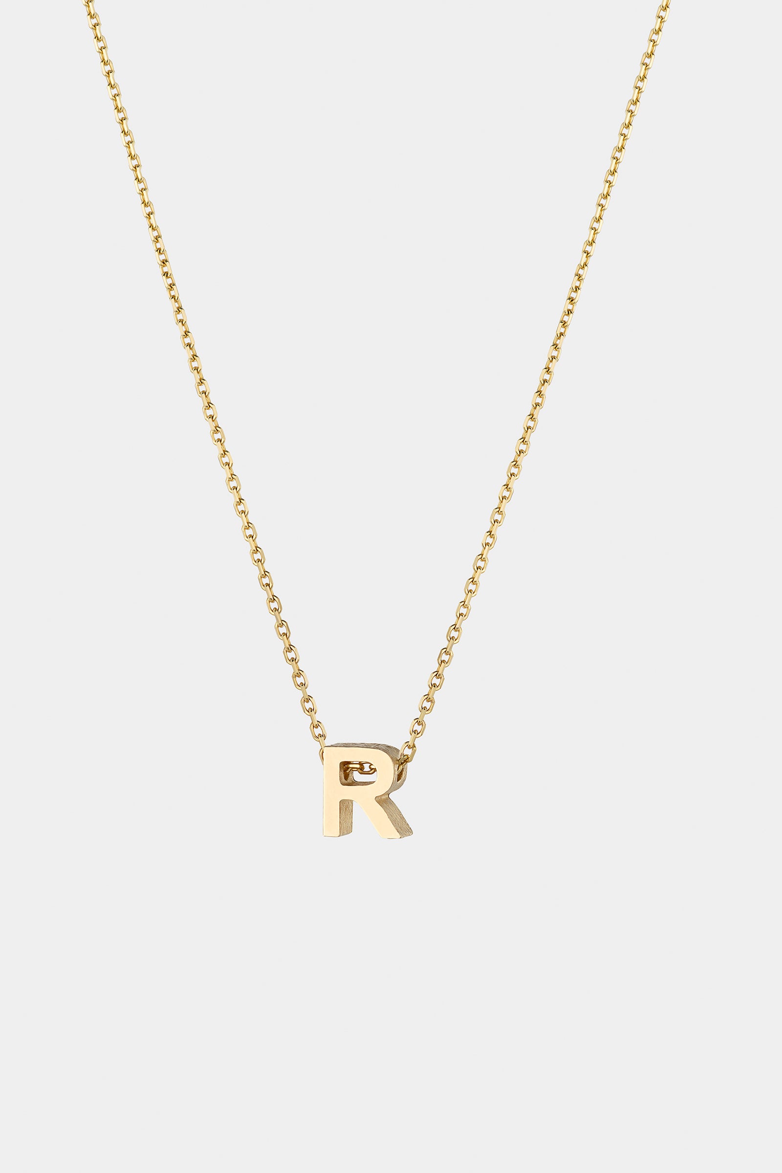 THE LETTER AUKSINĖ GRANDINĖLĖ SU DIDESNIU RAIDELĖS PAKABUKU