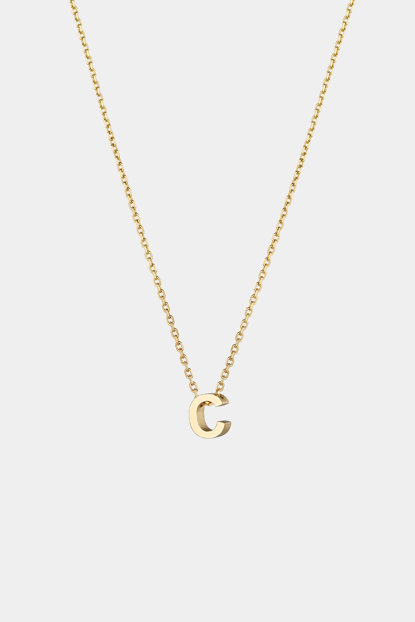 THE LETTER AUKSINĖ GRANDINĖLĖ SU DIDESNIU RAIDELĖS PAKABUKU