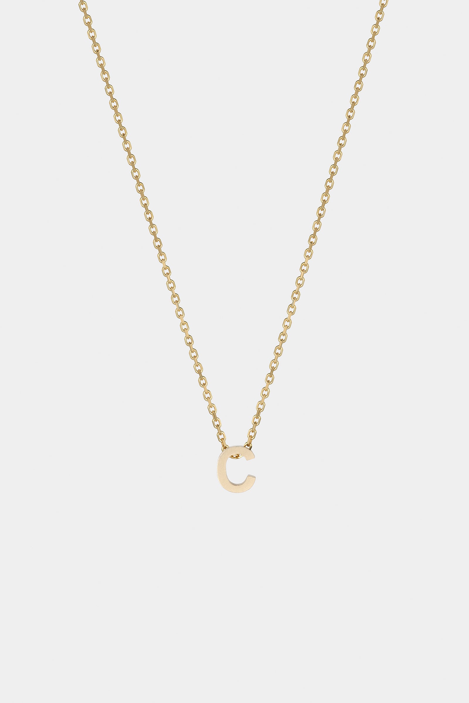 THE LETTER AUKSINĖ GRANDINĖLĖ SU DIDESNIU RAIDELĖS PAKABUKU