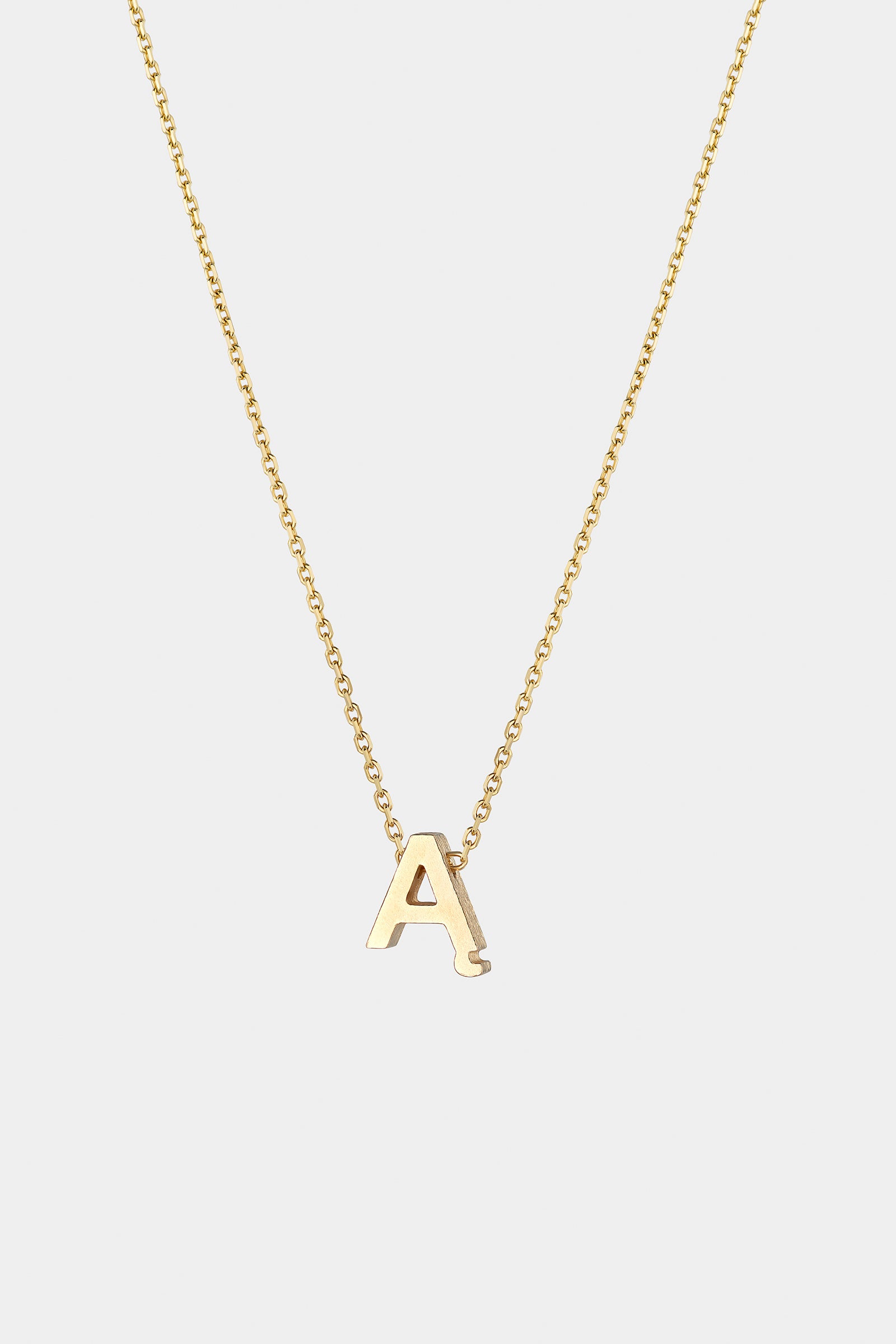 THE LETTER AUKSINĖ GRANDINĖLĖ SU DIDESNIU RAIDELĖS PAKABUKU