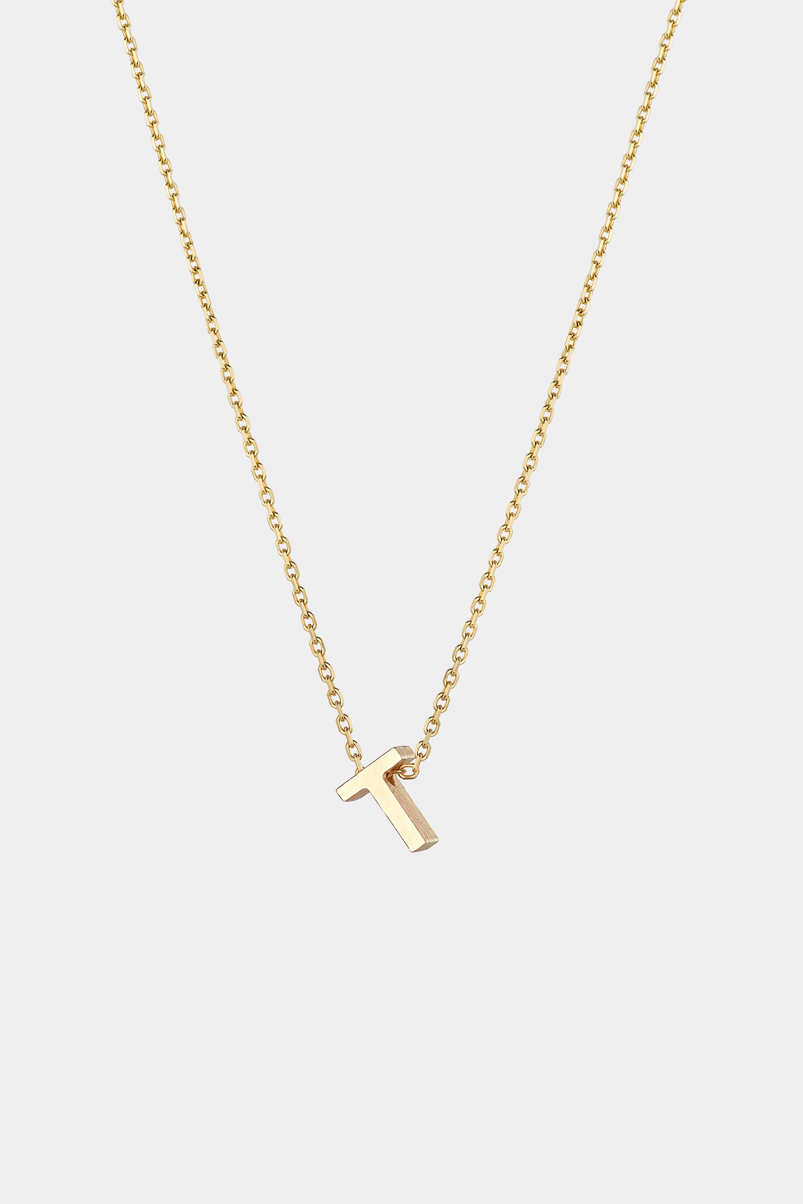 THE LETTER AUKSINĖ GRANDINĖLĖ SU DIDESNIU RAIDELĖS PAKABUKU